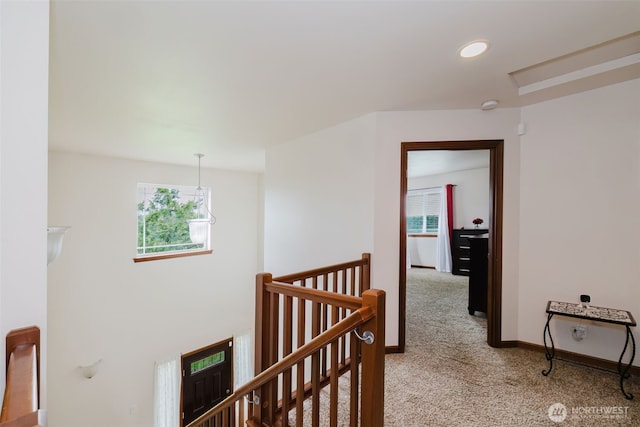 3323 Appaloosa Way, Bremerton, WA 98310 - corridor with an upstairs landing, light colored carpet, and baseboards