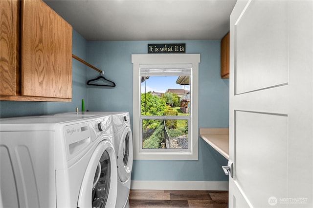 2336 Grand Ave, East Wenatchee, WA 98802 - laundry room featuring cabinet space, washer and clothes dryer, wood finished floors, and baseboards
