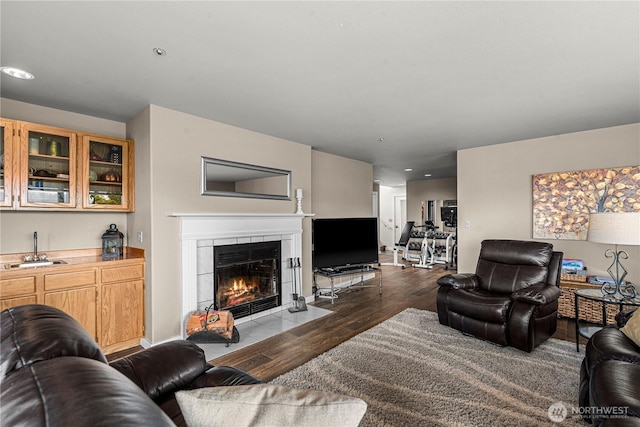 2336 Grand Ave, East Wenatchee, WA 98802 - living room featuring wood finished floors, a fireplace, and recessed lighting