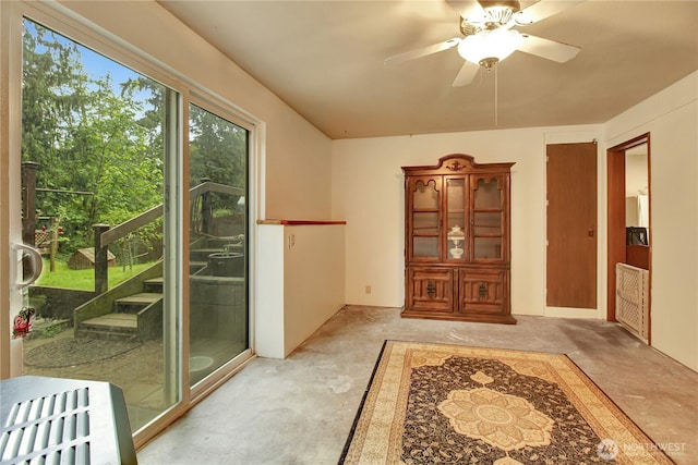 32030 83rd Dr NW, Stanwood, WA 98292 - doorway to outside with concrete flooring and ceiling fan