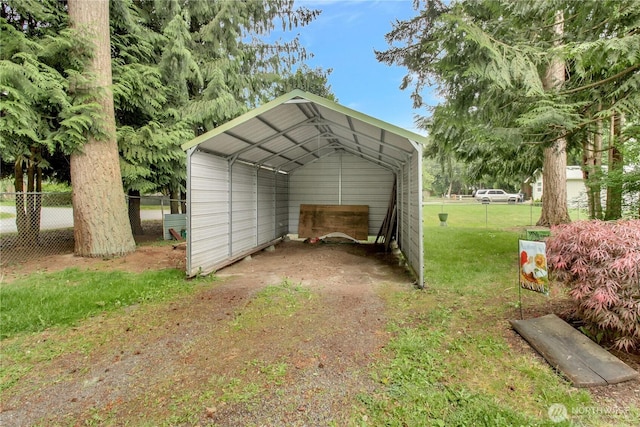32030 83rd Dr NW, Stanwood, WA 98292 - view of parking with a detached carport and driveway