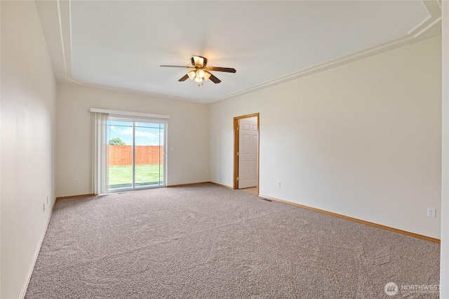 121 Scenic Dr NE, Moses Lake, WA 98837 - empty room with a ceiling fan, light carpet, baseboards, and crown molding