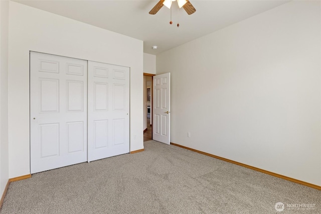 121 Scenic Dr NE, Moses Lake, WA 98837 - unfurnished bedroom featuring carpet flooring, baseboards, a closet, and ceiling fan
