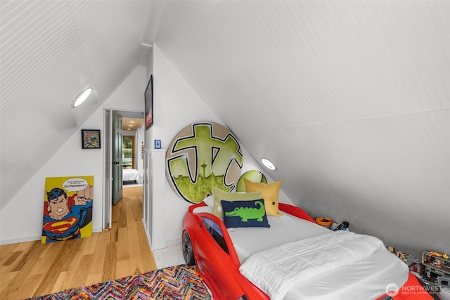 1900 N Westlake Ave N Unit 01Do7, Seattle, WA 98109 - bedroom with lofted ceiling, wood finished floors, and baseboards