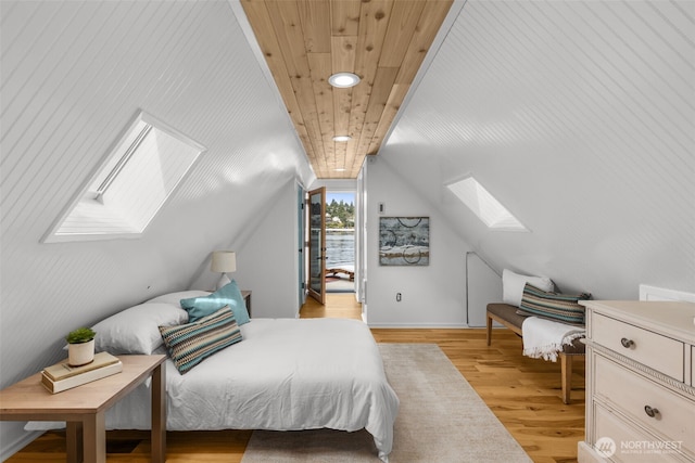 1900 N Westlake Ave N Unit 01Do7, Seattle, WA 98109 - bedroom featuring a skylight, lofted ceiling, light wood-style flooring, and recessed lighting