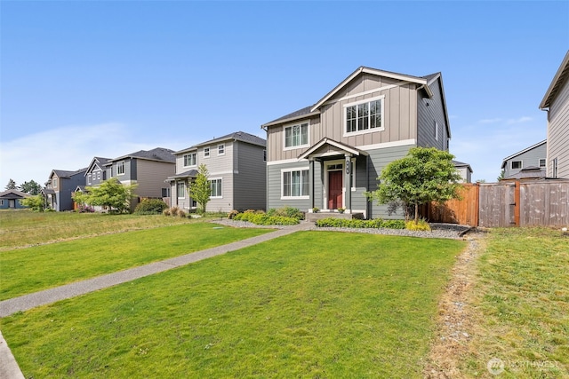 view of front of house featuring board and batten siding and a residential view