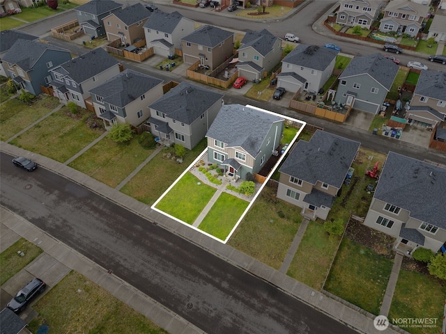 aerial perspective of suburban area with property boundaries highlighted