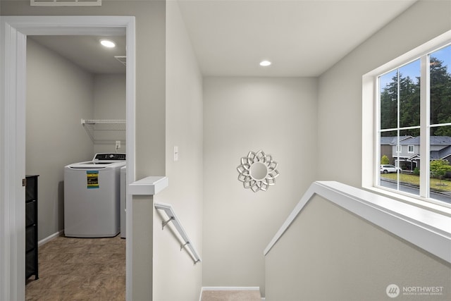 laundry room with baseboards and recessed lighting