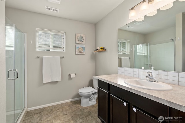 full bath with plenty of natural light and a shower stall