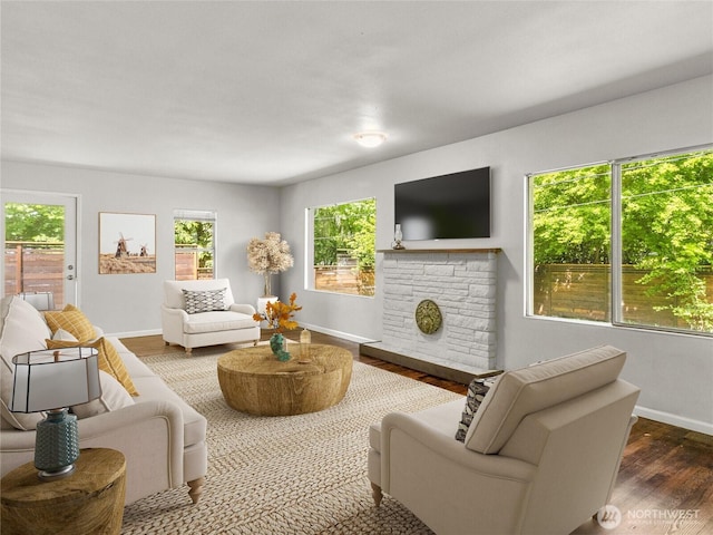 2101 Swanee Cir SE, Olympia, WA 98501 - living area featuring wood finished floors and a stone fireplace