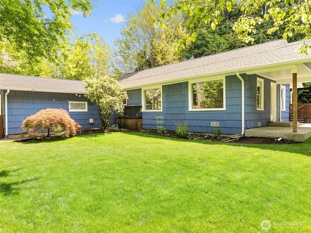 2101 Swanee Cir SE, Olympia, WA 98501 - ranch-style home with a front lawn and roof with shingles