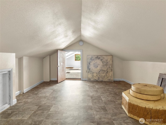 2101 Swanee Cir SE, Olympia, WA 98501 - additional living space with a textured ceiling and lofted ceiling