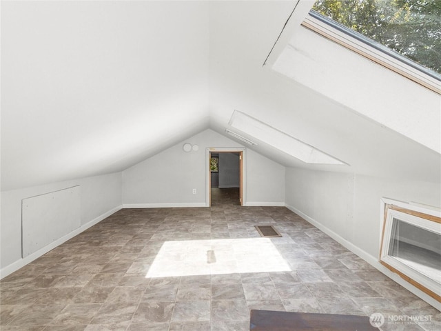 2101 Swanee Cir SE, Olympia, WA 98501 - bonus room with a skylight, vaulted ceiling, and stone finish floors