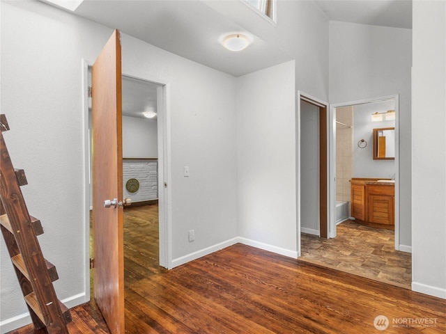 2101 Swanee Cir SE, Olympia, WA 98501 - unfurnished bedroom with wood finished floors and connected bathroom