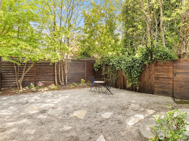 2101 Swanee Cir SE, Olympia, WA 98501 - fenced backyard with a patio