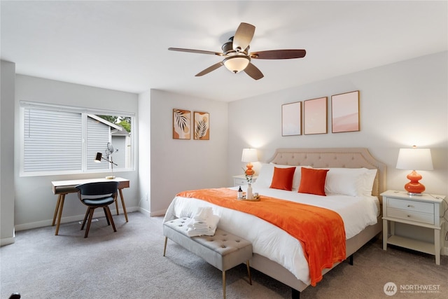 carpeted bedroom featuring baseboards and ceiling fan