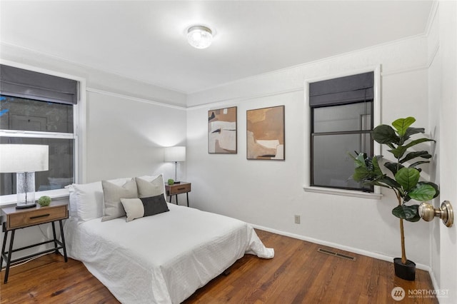 2607 NE 137th St, Seattle, WA 98125 - bedroom featuring wood finished floors, baseboards, and crown molding