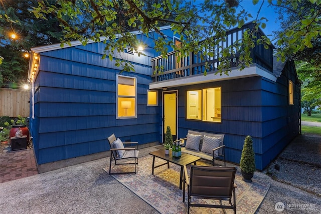 2607 NE 137th St, Seattle, WA 98125 - rear view of house featuring a balcony, outdoor lounge area, and a patio