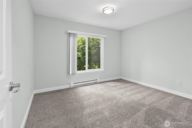 12303 Harbour Pointe Blvd Unit U109, Mukilteo, WA 98275 - spare room featuring baseboard heating, carpet floors, and baseboards