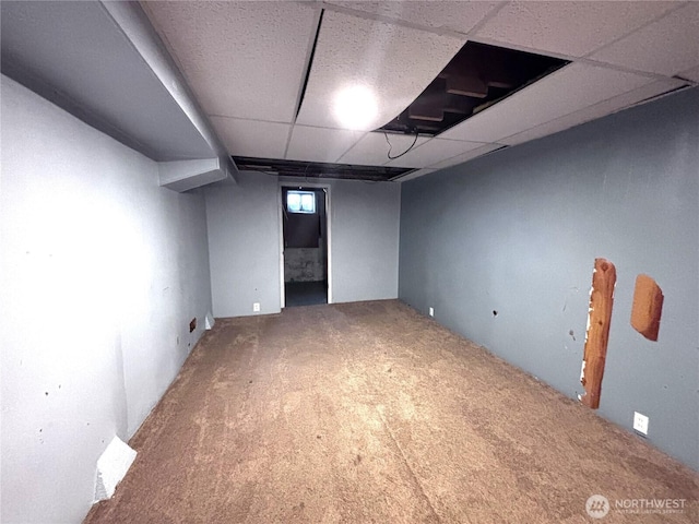 711 Guernsey St, Prosser, WA 99350 - below grade area with carpet flooring and a paneled ceiling