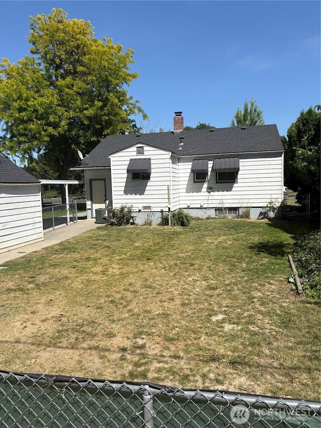 711 Guernsey St, Prosser, WA 99350 - rear view of property with a chimney