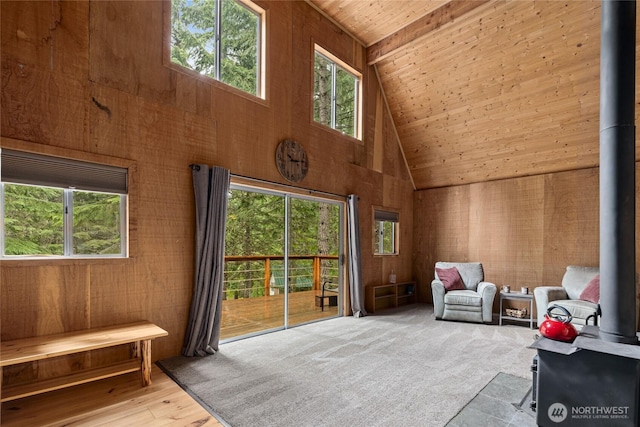 4771 Kachess Lake Rd, Easton, WA 98925 - sitting room with high vaulted ceiling, wooden ceiling, wooden walls, plenty of natural light, and wood finished floors