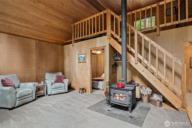 4771 Kachess Lake Rd, Easton, WA 98925 - living area with wood ceiling, a wood stove, and carpet