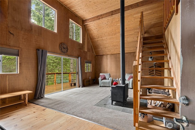 4771 Kachess Lake Rd, Easton, WA 98925 - interior space with a wood stove, wooden ceiling, high vaulted ceiling, healthy amount of natural light, and hardwood / wood-style floors