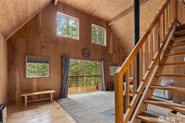 4771 Kachess Lake Rd, Easton, WA 98925 - entrance foyer featuring wood ceiling, hardwood / wood-style floors, wood walls, stairway, and high vaulted ceiling