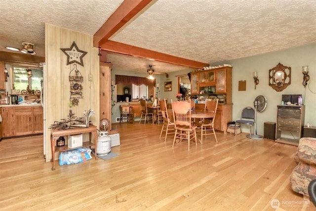 35904 Allen Rd S, Roy, WA 98580 - dining area with a textured ceiling, light wood finished floors, and a ceiling fan