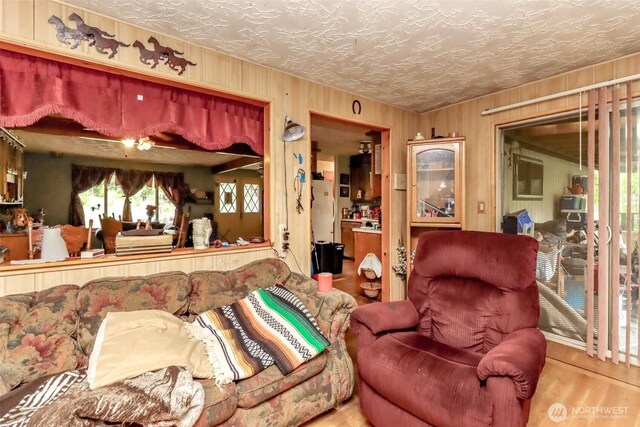 35904 Allen Rd S, Roy, WA 98580 - living area with wood walls and wood finished floors