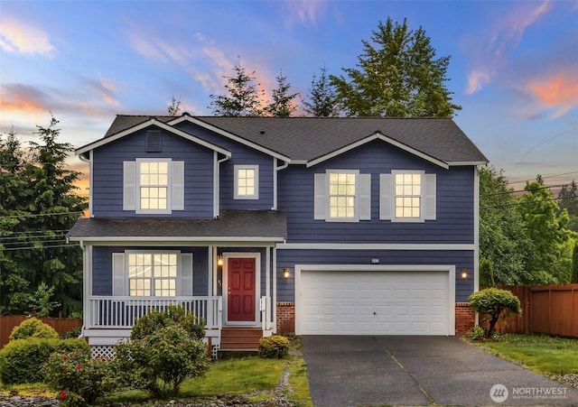 5330 115th Pl SE, Everett, WA 98208 - traditional home with fence, a garage, covered porch, driveway, and a shingled roof