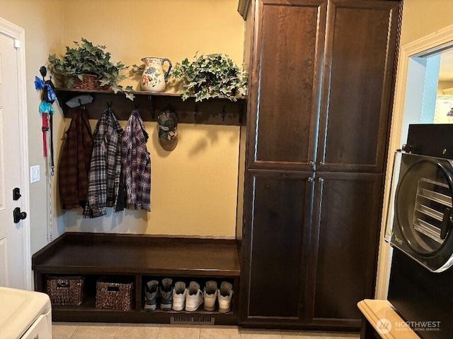 2702 N Levi St, Kennewick, WA 99338 - mudroom featuring washer / dryer and tile patterned floors