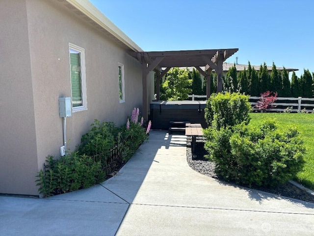 2702 N Levi St, Kennewick, WA 99338 - view of yard with a hot tub, fence, a pergola, and a patio