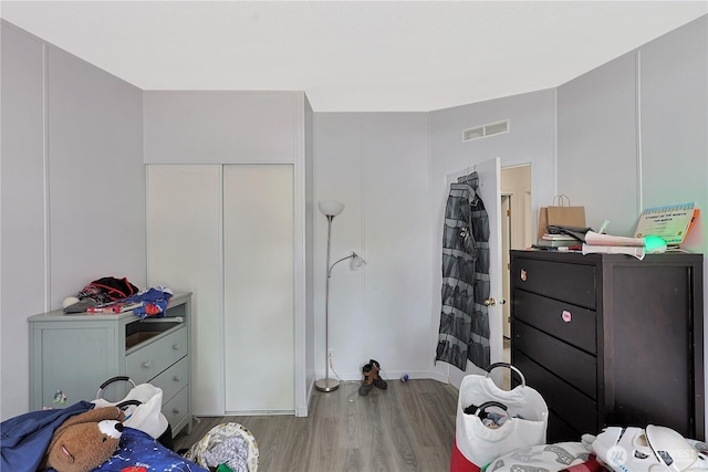 30425 6th Ave S, Roy, WA 98580 - bedroom featuring wood finished floors and a closet