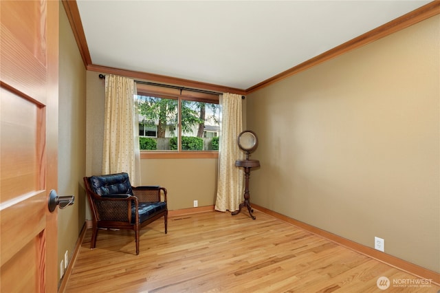 12211 SE 65th Pl, Bellevue, WA 98006 - living area with ornamental molding, light wood-style flooring, and baseboards