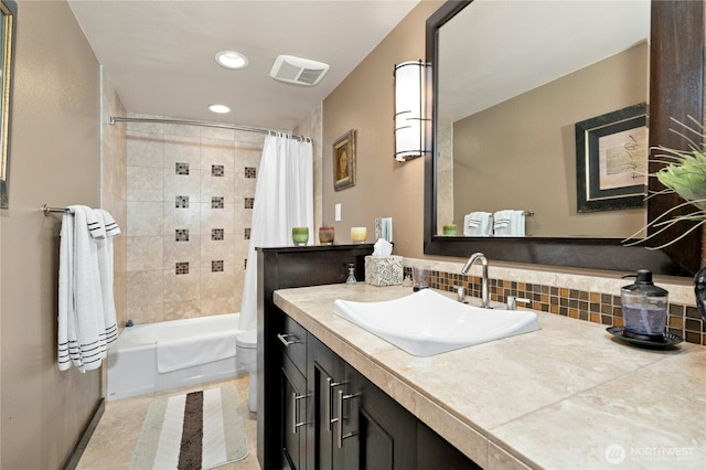 12211 SE 65th Pl, Bellevue, WA 98006 - full bath featuring vanity, toilet, shower / tub combo with curtain, backsplash, and recessed lighting