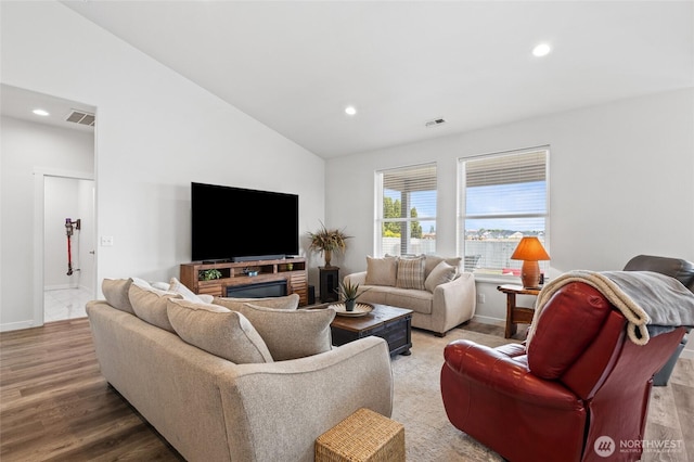 227 N Crestview Dr, Moses Lake, WA 98837 - living area featuring recessed lighting, vaulted ceiling, baseboards, and wood finished floors