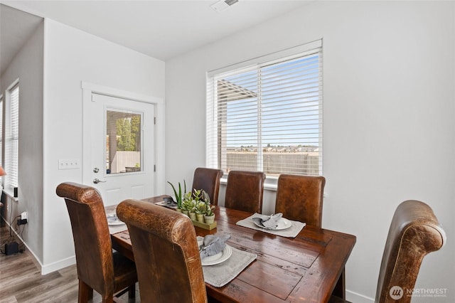 227 N Crestview Dr, Moses Lake, WA 98837 - dining space featuring wood finished floors and baseboards
