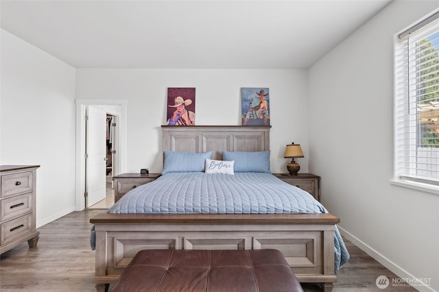 227 N Crestview Dr, Moses Lake, WA 98837 - bedroom with baseboards and wood finished floors
