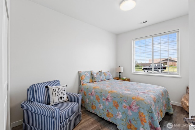 227 N Crestview Dr, Moses Lake, WA 98837 - bedroom featuring wood finished floors and baseboards