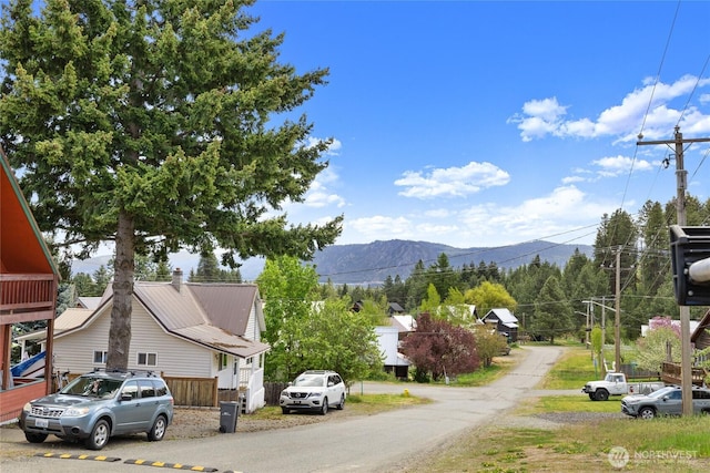 511 S 2nd St, Roslyn, WA 98941 - view of asphalt road featuring a mountain view and street lights