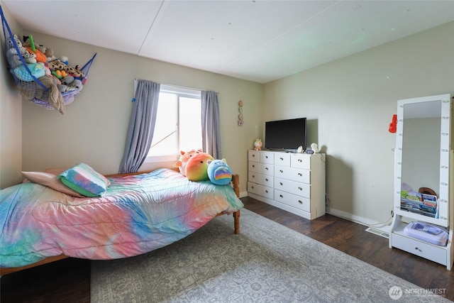 208 S Monroe St, Aberdeen, WA 98520 - bedroom with wood finished floors and baseboards
