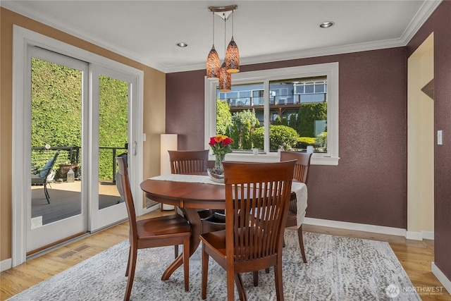 245 SW 298th Pl, Federal Way, WA 98023 - dining area with wood finished floors, baseboards, ornamental molding, and a textured wall