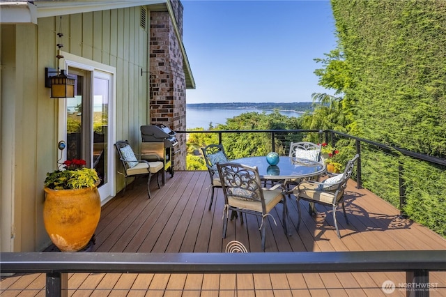 245 SW 298th Pl, Federal Way, WA 98023 - wooden terrace featuring a water view, outdoor dining space, and a grill