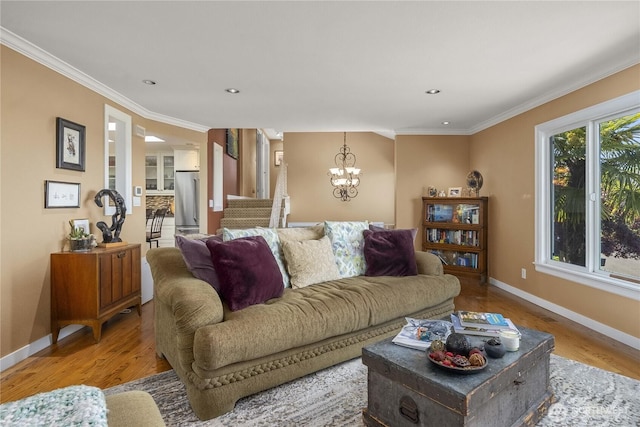 245 SW 298th Pl, Federal Way, WA 98023 - living area featuring a chandelier, baseboards, crown molding, wood finished floors, and recessed lighting