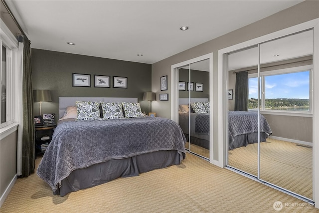 245 SW 298th Pl, Federal Way, WA 98023 - bedroom featuring carpet, two closets, baseboards, and recessed lighting