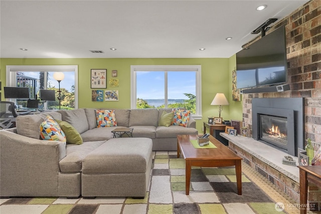 245 SW 298th Pl, Federal Way, WA 98023 - living area featuring a brick fireplace and recessed lighting