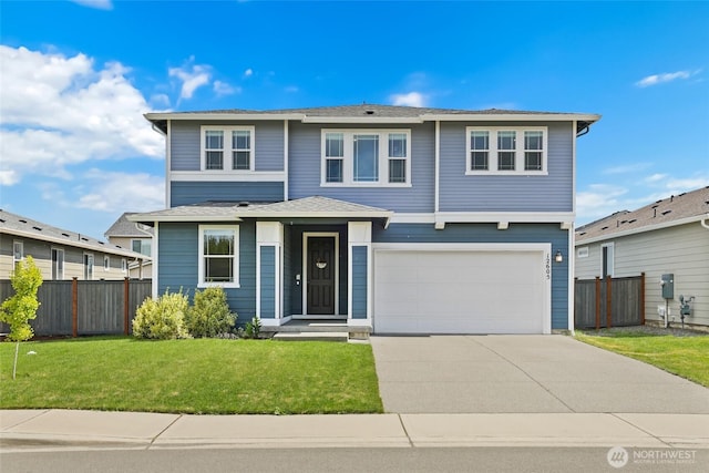 12605 179th St E, Puyallup, WA 98374 - view of front facade featuring an attached garage and concrete driveway