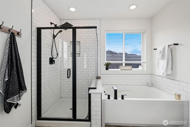 12605 179th St E, Puyallup, WA 98374 - full bathroom with a garden tub, a stall shower, and recessed lighting